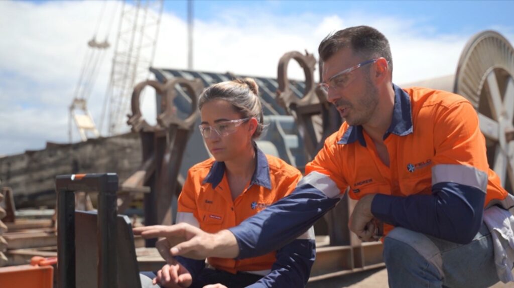 female and male engineers at Field Engineers